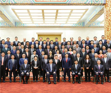 习近平会见第十届世界华侨华人社团联谊大会代表