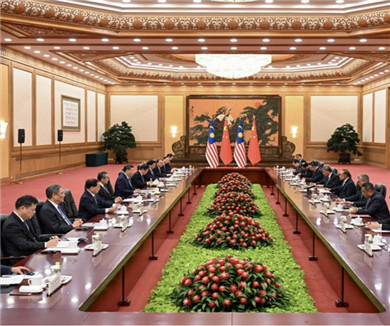 习近平会见马来西亚总理
